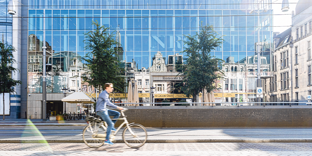 Photo of a man riding a bicycle