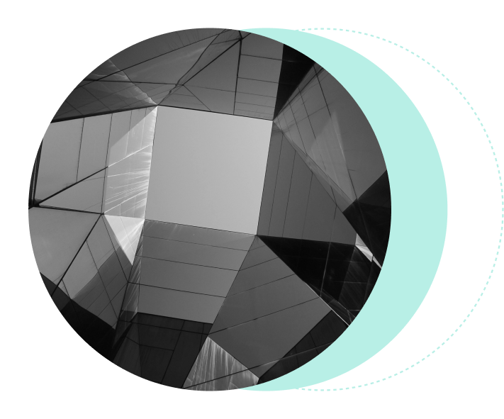 Abstract geometric architecture with revenue automation software and overlaid semi-transparent teal circle.