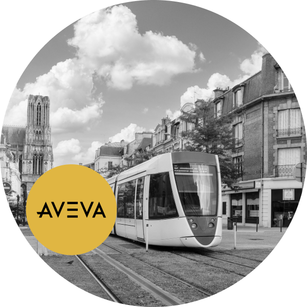 Ein kreisförmiges Schwarzweißbild einer modernen Straßenbahn, die auf Gleisen in einer städtischen Umgebung mit historischen Gebäuden und einer Kathedrale im Hintergrund fährt. Über dem Bild liegt ein Logo mit der Aufschrift „Aveva“.