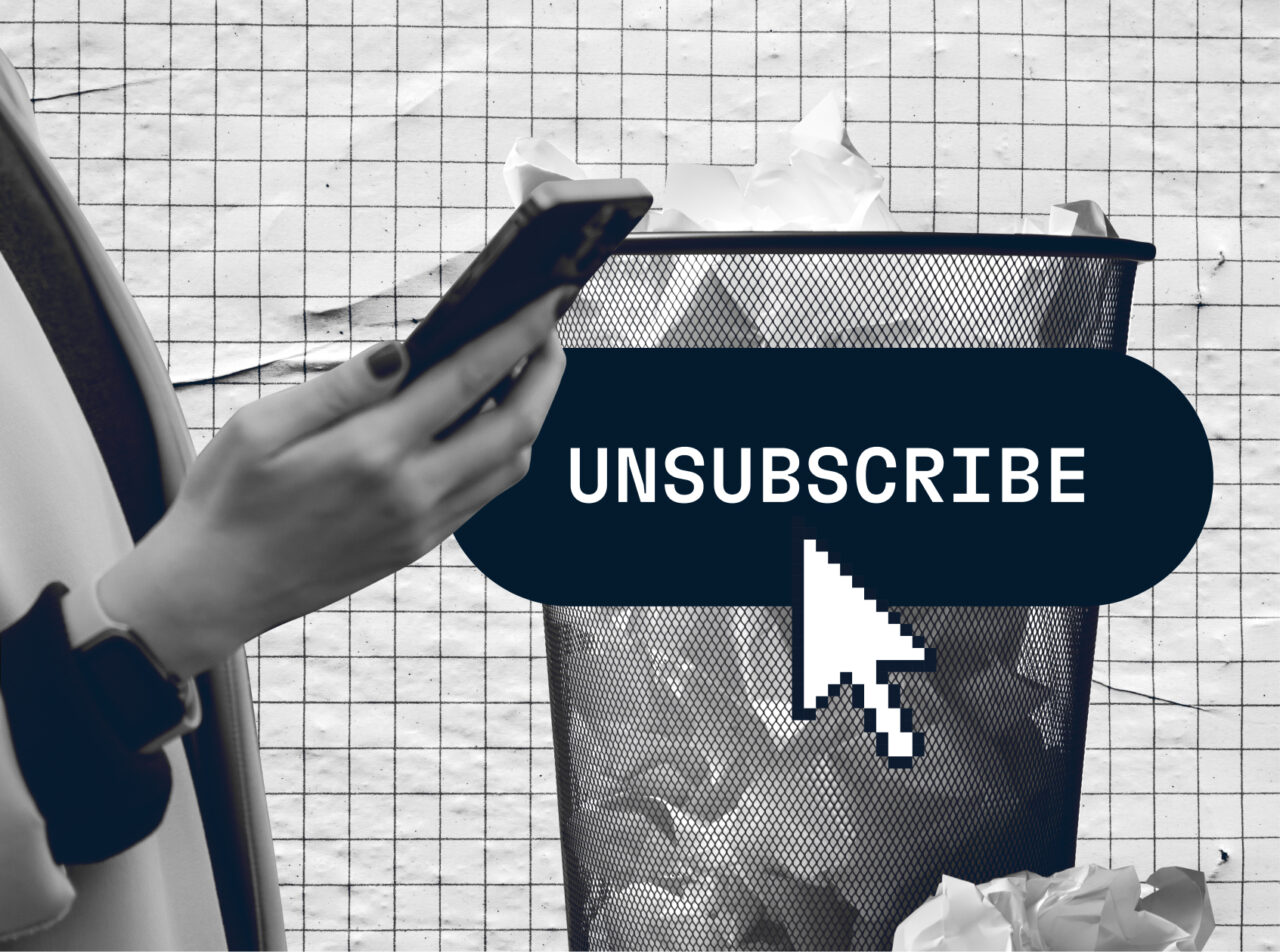A person holding a phone next to a trash can with a large "UNSUBSCRIBE" button graphic and a cursor icon on it.