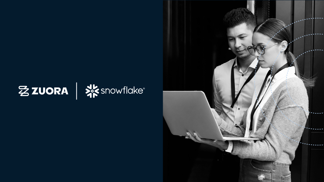 Two professionals stand together looking at a laptop, with Zuora and Snowflake logos displayed on a dark background beside them.